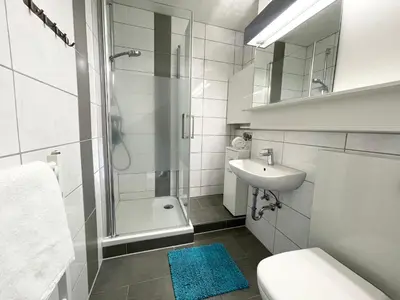 Ein Badezimmer in der Unterkunft Frische Brise FeWo 01.04