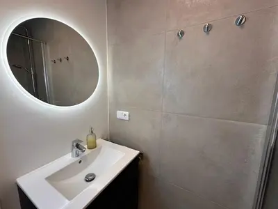 Ein Badezimmer in der Unterkunft Wellen & Wind - Moderne Ferienwohnung mit Meerblick
