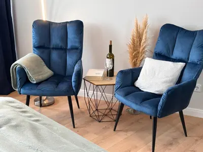 Ein Sitzbereich in der Unterkunft Wellen & Wind - Moderne Ferienwohnung mit Meerblick