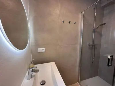 Ein Badezimmer in der Unterkunft Wellen & Wind - Moderne Ferienwohnung mit Meerblick
