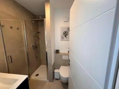 Ein Badezimmer in der Unterkunft Wellen & Wind - Moderne Ferienwohnung mit Meerblick
