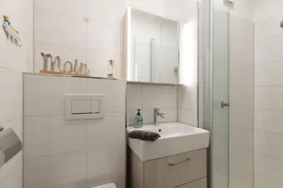 Ein Badezimmer in der Unterkunft Top gelegene FeWo Strandkoje an der Perlebucht