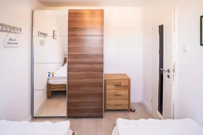 Ein Bett oder Betten in einem Zimmer der Unterkunft Duhner Ausblick mit Balkon