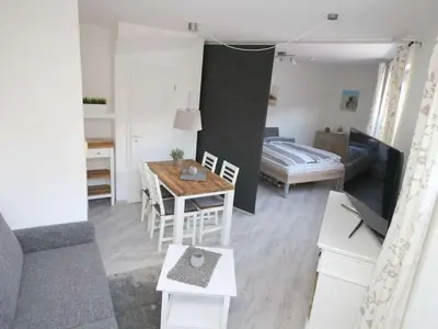 Ein Bett oder Betten in einem Zimmer der Unterkunft ToNi