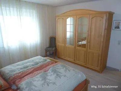 Ein Bett oder Betten in einem Zimmer der Unterkunft House Poseidon comfort holiday residence