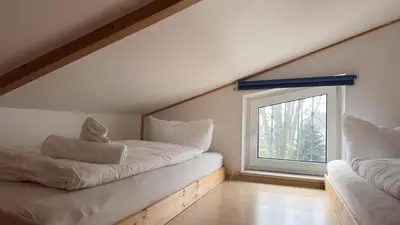 Ein Bett oder Betten in einem Zimmer der Unterkunft Schilingshof WHG 3