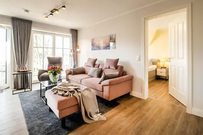 Ein Sitzbereich in der Unterkunft Büsumer Reethus Apartment 2 3