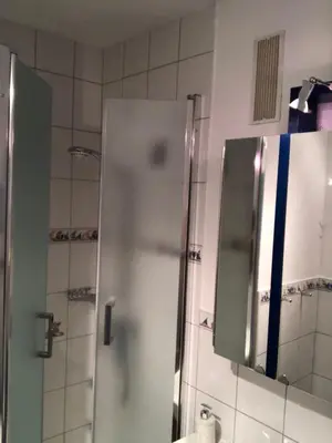 Ein Badezimmer in der Unterkunft Direkt am Strand