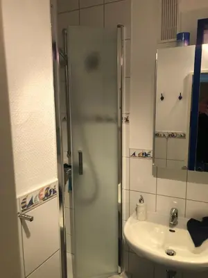 Ein Badezimmer in der Unterkunft Direkt am Strand