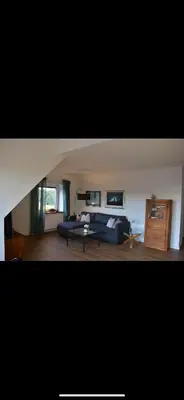 Ein Bett oder Betten in einem Zimmer der Unterkunft Deichkieker