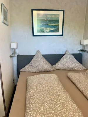Ein Bett oder Betten in einem Zimmer der Unterkunft Backbord