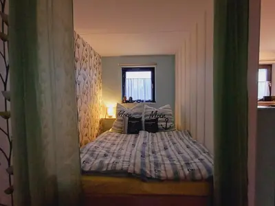 Ein Bett oder Betten in einem Zimmer der Unterkunft Ferienwohnung Seelenbrise