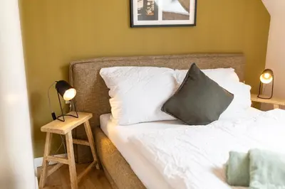Ein Bett oder Betten in einem Zimmer der Unterkunft Nordseehof Brömmer Deichhus