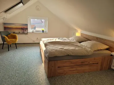 Ein Bett oder Betten in einem Zimmer der Unterkunft Ferienhaus Frieda