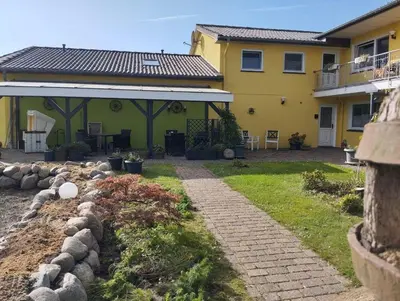 Ein Garten an der Unterkunft Fewo-Nordseekueste