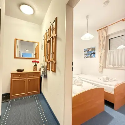 Ein Bett oder Betten in einem Zimmer der Unterkunft Voßhörn 3 Wohnung 2