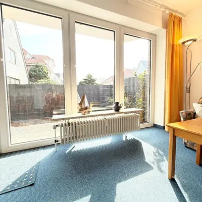 Ein Sitzbereich in der Unterkunft Voßhörn 3 Wohnung 2