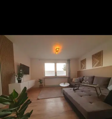 Ein Sitzbereich in der Unterkunft Ferienwohnung in einer idyllischen Lage