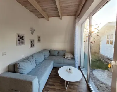 Ein Sitzbereich in der Unterkunft Ferienhaus ROSA mit Sauna