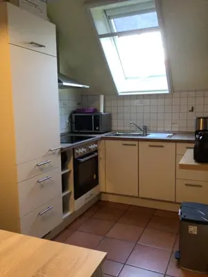 Küche/Küchenzeile in der Unterkunft Ferienwohnung Kuhlmann Wurster Nordseeküste