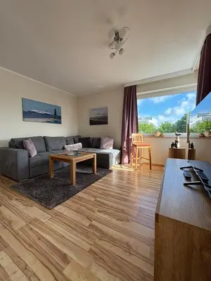 Ein Sitzbereich in der Unterkunft Haus Poseidon, Ferienwohnung POS36