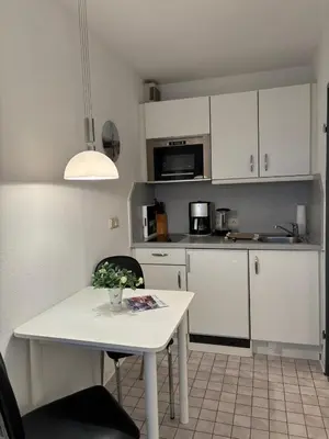 Küche/Küchenzeile in der Unterkunft Haus Pavillon, Ferienwohnung 13