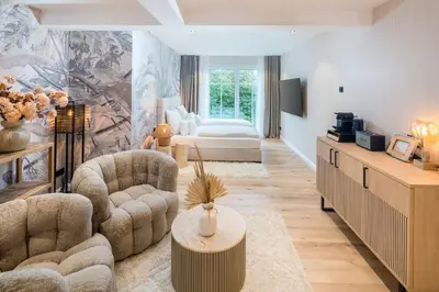Ein Sitzbereich in der Unterkunft Das Oswald's Boutique Hotel