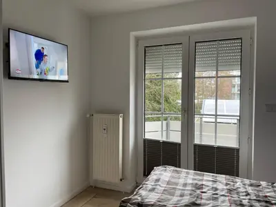 Ein Bett oder Betten in einem Zimmer der Unterkunft Steinmarne Wohnung 6