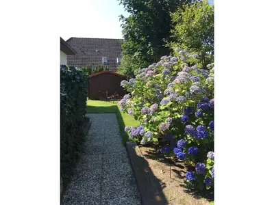 Ein Garten an der Unterkunft Watt´n Drööm