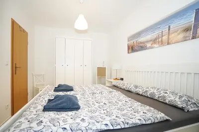 Ein Bett oder Betten in einem Zimmer der Unterkunft Residenz Meeresbrandung