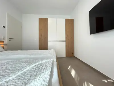 Ein Bett oder Betten in einem Zimmer der Unterkunft SeaView W03
