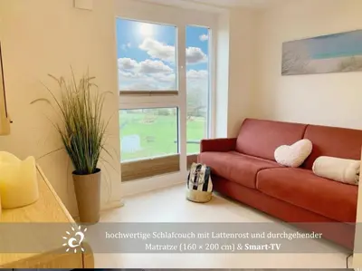 Ein Sitzbereich in der Unterkunft Penthouse De Lark