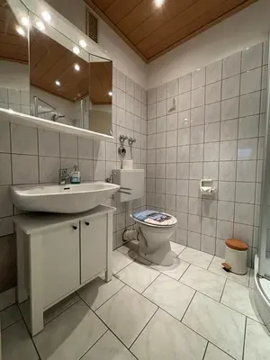Ein Badezimmer in der Unterkunft Haus Poseidon, Apartment POS03