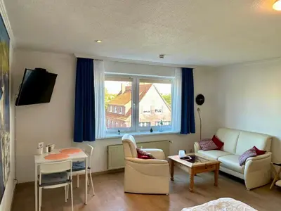Ein Sitzbereich in der Unterkunft Haus Elbe -Wohnung 14- Zentral in Döse