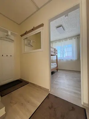 Ein Bett oder Betten in einem Zimmer der Unterkunft Haus Poseidon, Ferienwohnung POS31