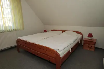 Ein Bett oder Betten in einem Zimmer der Unterkunft Ferienhaus Fischotter - 300m zum Wattenmeer - All Inklusive