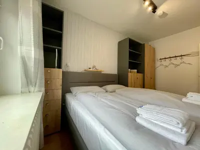 Ein Bett oder Betten in einem Zimmer der Unterkunft Wattrevier No4