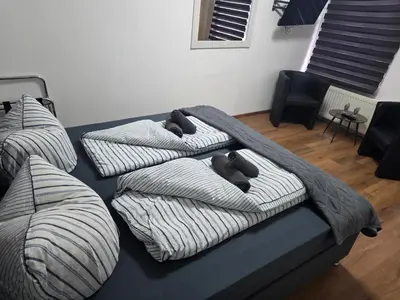 Ein Bett oder Betten in einem Zimmer der Unterkunft Gästehaus Strandbake