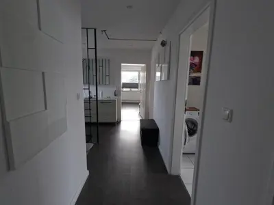 Ein Bett oder Betten in einem Zimmer der Unterkunft Ferienwohnung in Brunsbüttel mit E-Bike Verleih