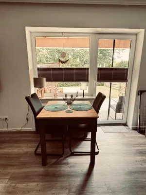 Ein Sitzbereich in der Unterkunft Apartment 2 - Haus Heinke am Deich