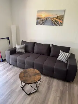 Ein Sitzbereich in der Unterkunft Apartment 2 - Haus Heinke am Deich