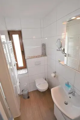 Ein Badezimmer in der Unterkunft Haus Kaiser Ferienwohnung 7 Deichblick
