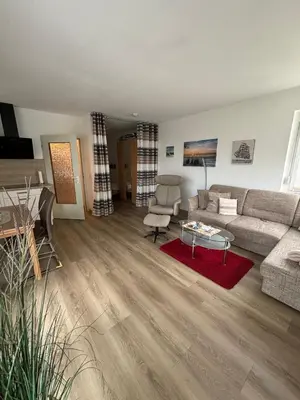 Ein Sitzbereich in der Unterkunft Haus Poseidon, Apartment POS05