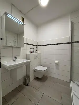 Ein Badezimmer in der Unterkunft Haus Poseidon, Ferienwohnung POS33