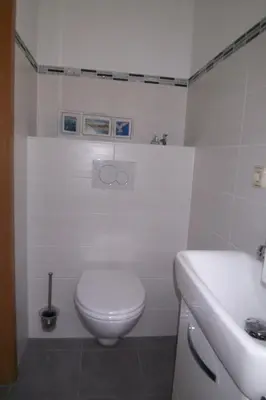 Ein Badezimmer in der Unterkunft Ferienhaus Alter Duhner Weg