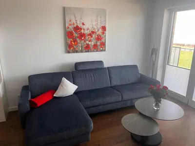 Ein Sitzbereich in der Unterkunft Duhner Spitze Wohnung 12