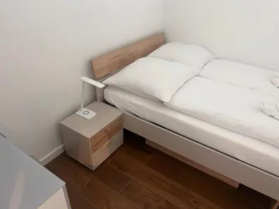 Ein Bett oder Betten in einem Zimmer der Unterkunft Duhner Spitze Wohnung 12