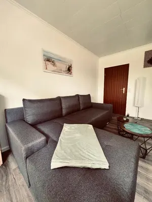 Ein Sitzbereich in der Unterkunft Apartment 3 - Haus Heinke am Deich
