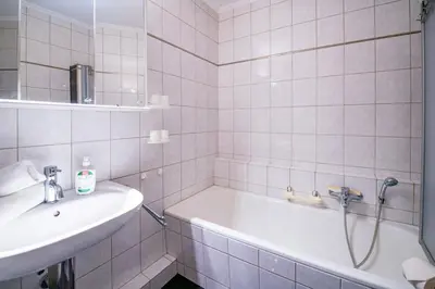 Ein Badezimmer in der Unterkunft Strandhochhaus SHC5