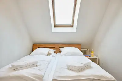 Ein Bett oder Betten in einem Zimmer der Unterkunft Dallacker 13 - Dachgeschoss